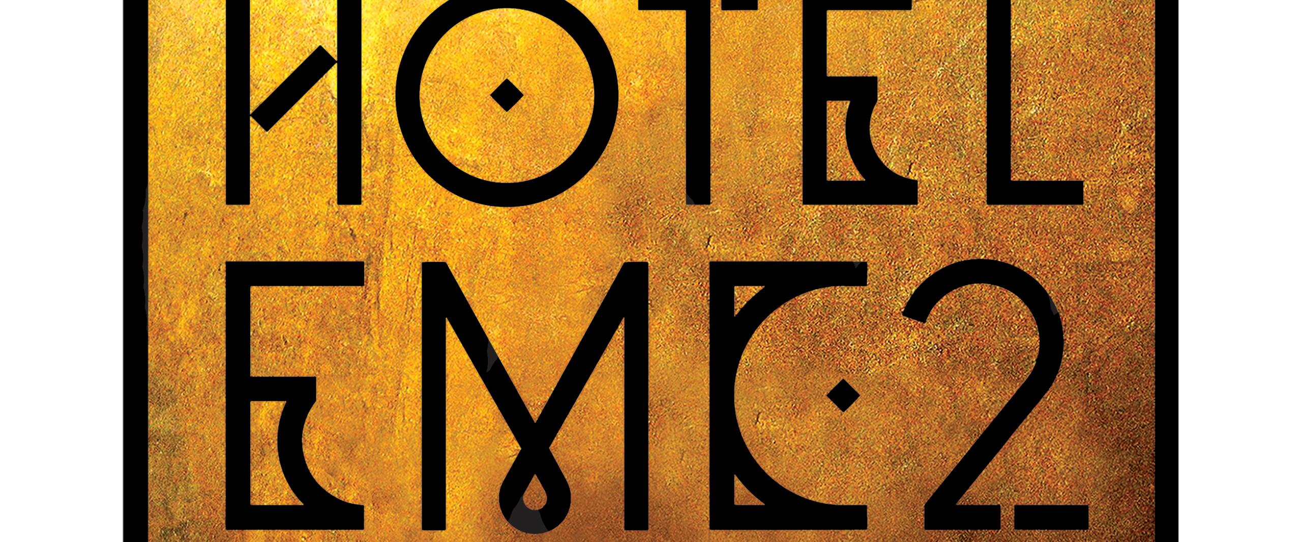 Hotel EMC2 logo with bold black lettering on a textured gold background.