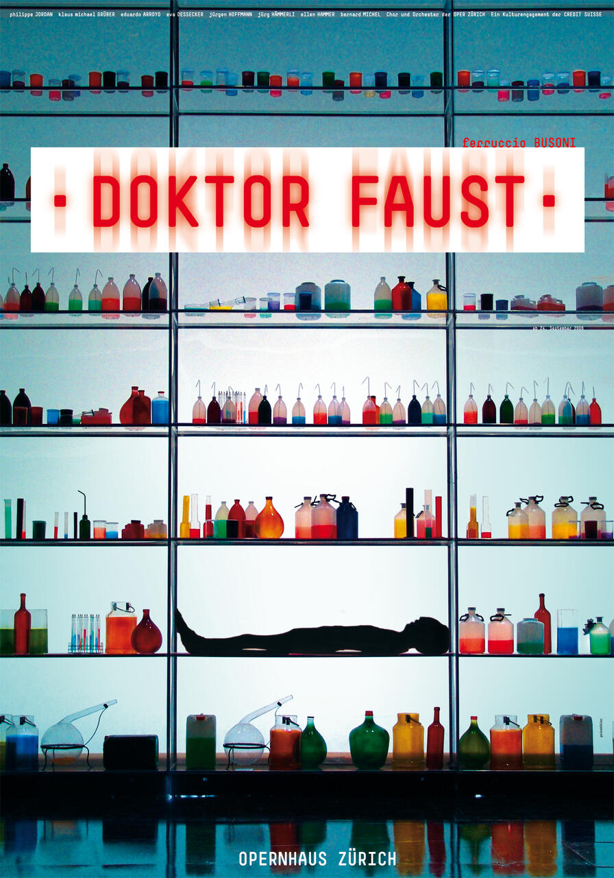 Silhouette of a person lying on a shelf surrounded by colorful glass bottles, flasks, and beakers in a laboratory setting. Bright lighting emphasizes the array of vibrant containers on multiple shelves.