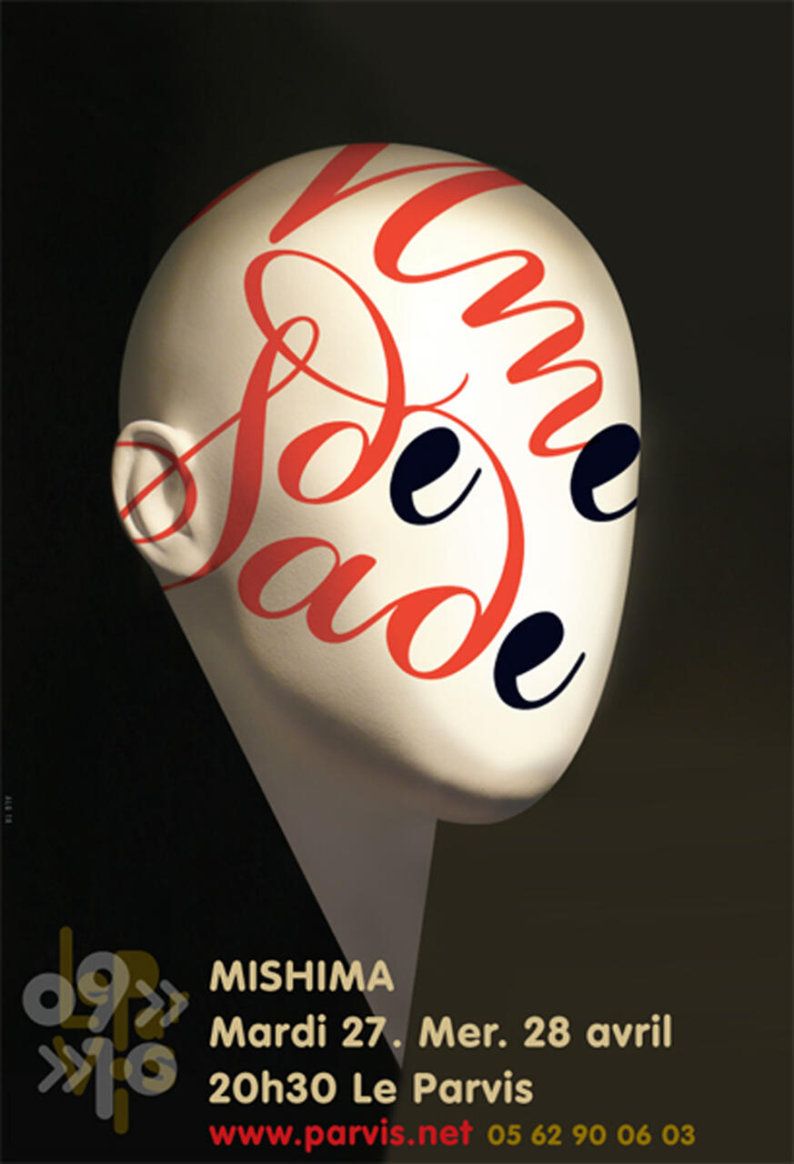 A mannequin head with stylized red and black script painted across its face, set against a dark background. The bottom features text details in white, yellow, and red.