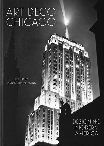 Art Deco-style skyscraper at night, illuminated with bright lights against a dark, cloudy sky, with the title "Art Deco Chicago" and subtitle "Designing Modern America" in text overlay.