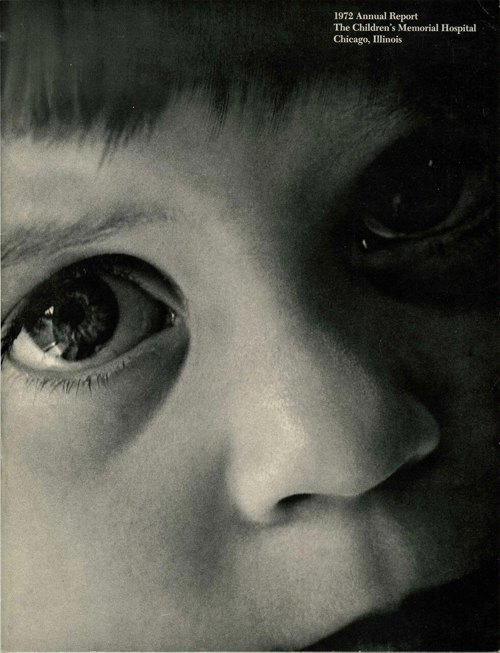 Close-up black and white photograph of a child's face, focusing on the eye and nose, conveying a sense of curiosity and innocence.