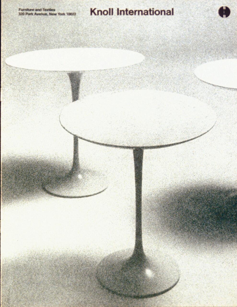 Three white pedestal tables on a textured background, with the words "Knoll International" at the top.