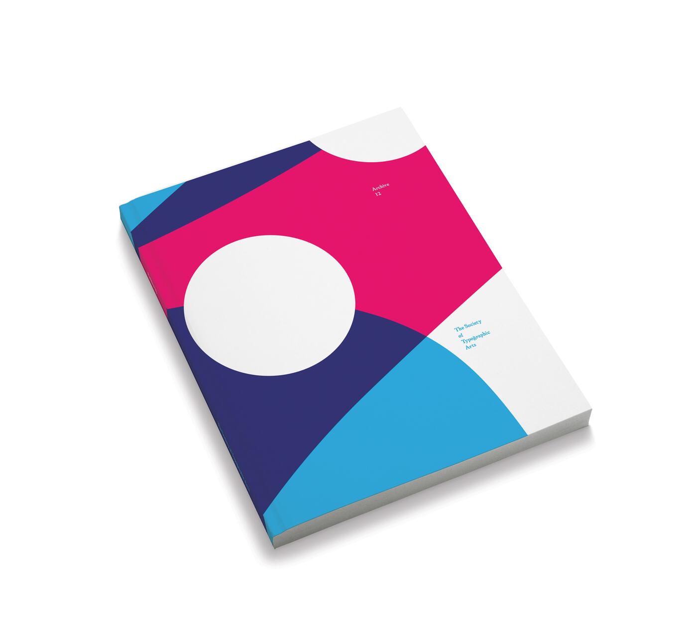 Book with a colorful abstract cover featuring blue, pink, and purple geometric shapes and white circles against a white background.