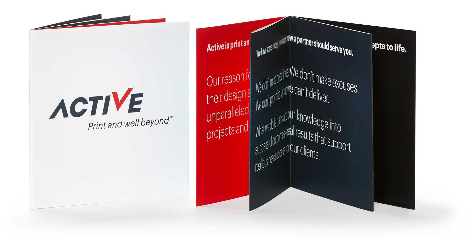 Brochure with the logo "ACTIVE" in bold letters on a white cover. Inside, red and black pages display text in white, emphasizing clear, professional design and messaging.