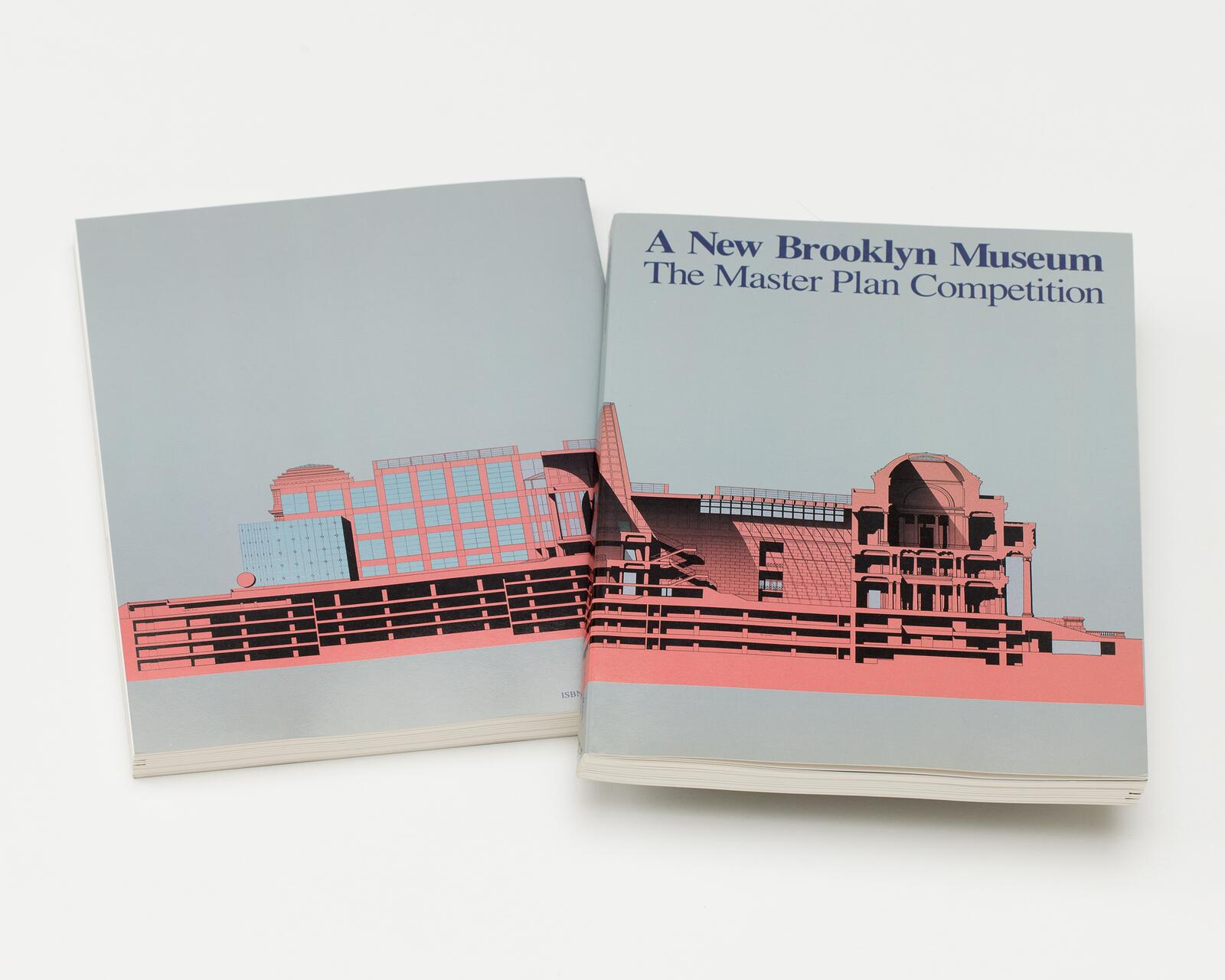 Two brochures lie open, featuring an illustration of a building with angular, modern architecture in pink and blue hues. The front cover text reads, "A New Brooklyn Museum: The Master Plan Competition."