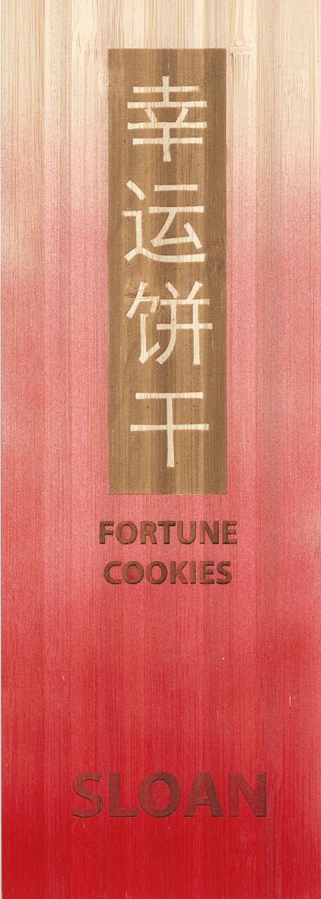 Red and beige packaging with Chinese characters in a brown vertical rectangle and the words "Fortune Cookies" below, followed by "Sloan."