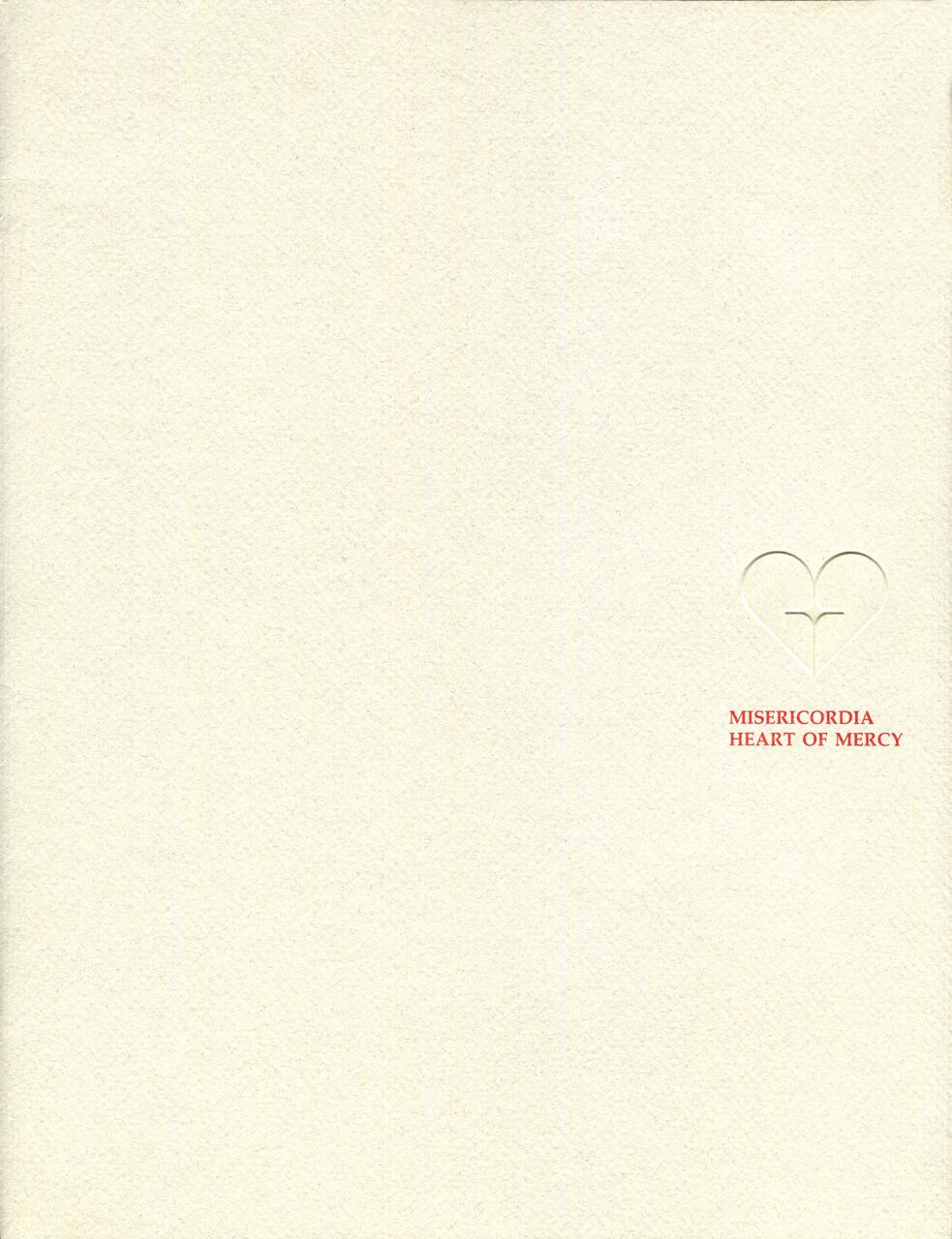 Cream-colored textured paper with an embossed heart design and red text nearby reading "Misericordia Heart of Mercy."