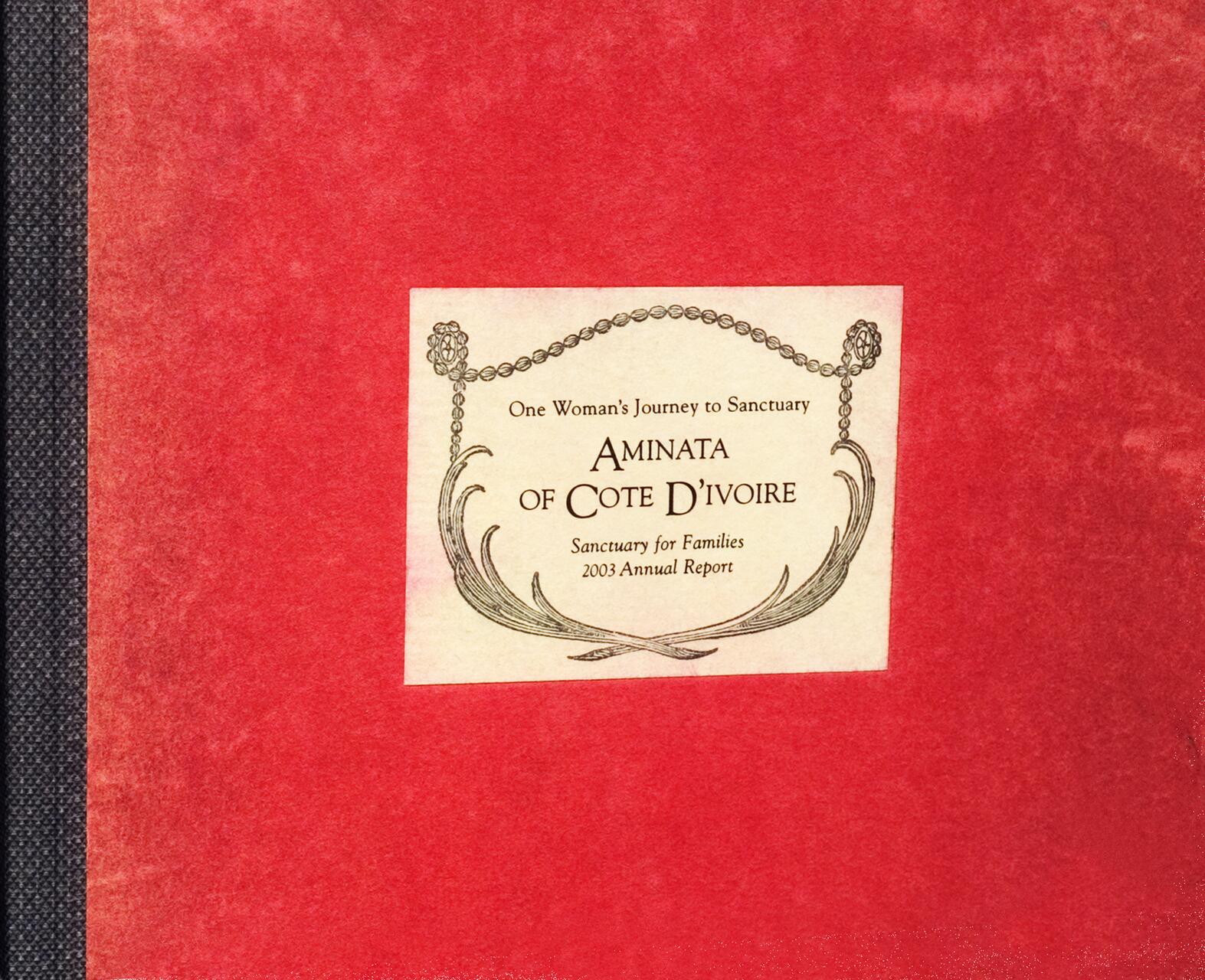 Red cover of a 2003 annual report titled "Aminata of Cote D'Ivoire" by Sanctuary for Families, featuring decorative border elements surrounding the text.
