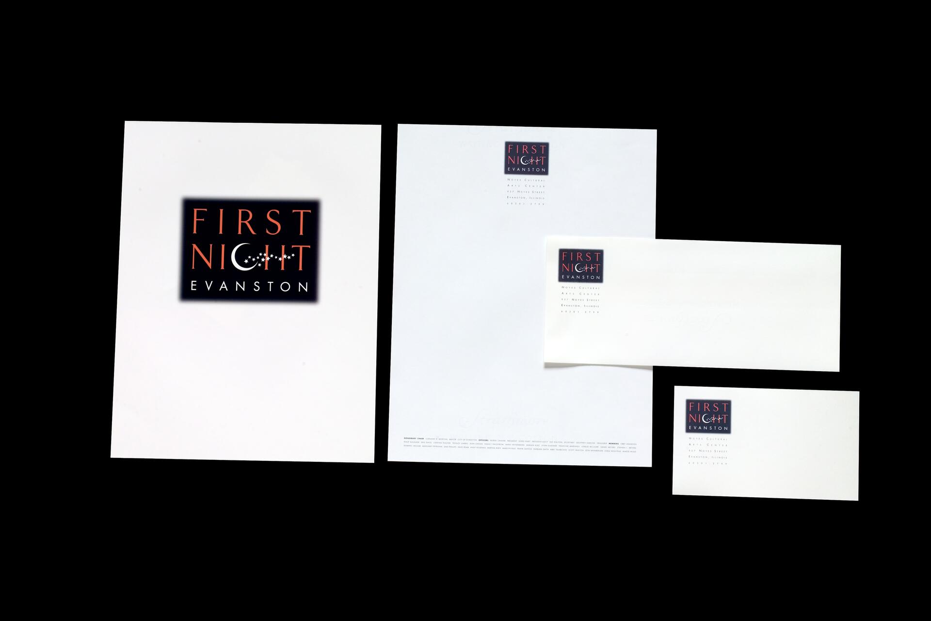 Set of stationery featuring the "First Night Evanston" logo. Includes a large sheet, letterhead, envelope, and smaller card, all primarily white with a black and red logo.