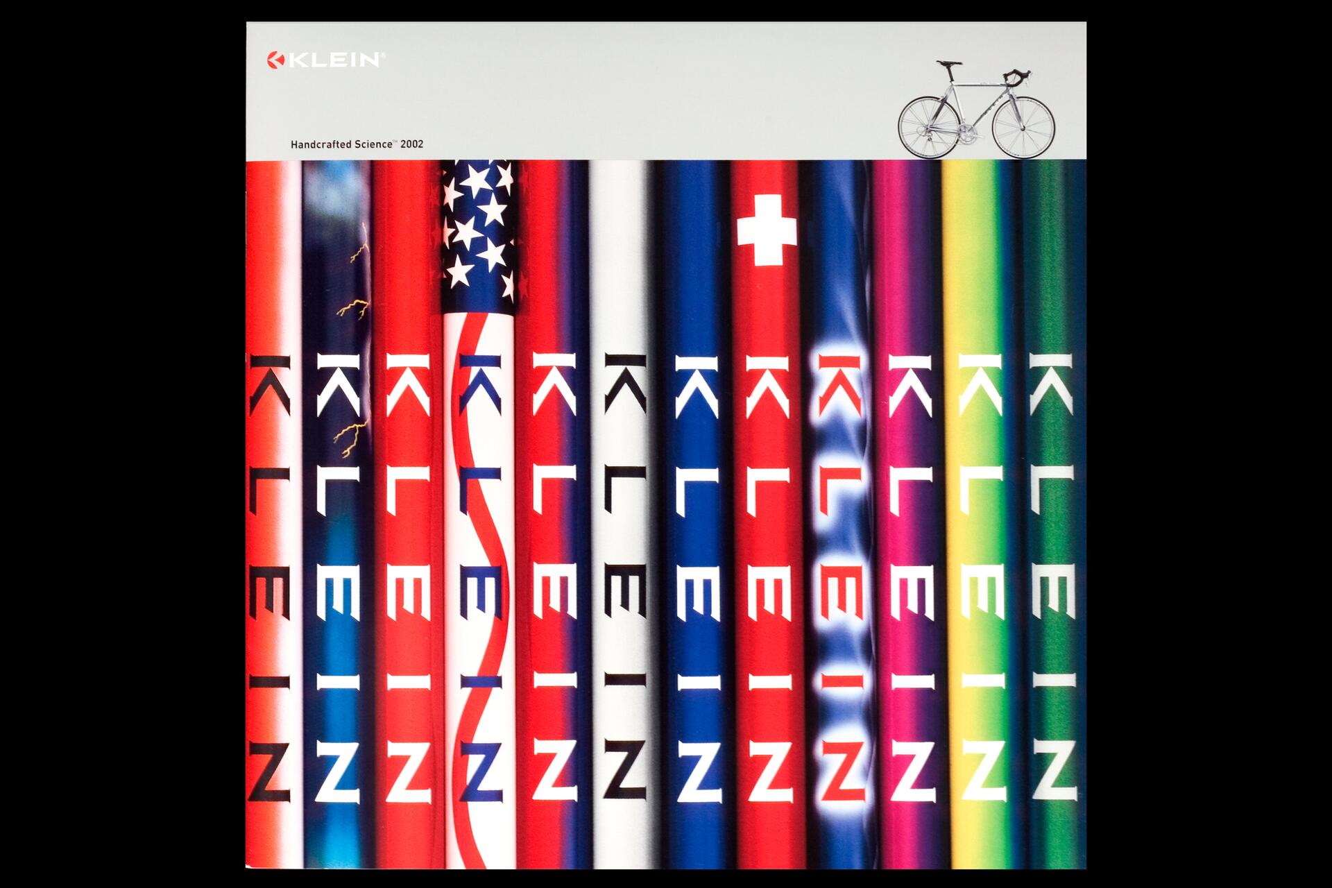 Colorful Klein bicycles design catalog cover featuring various vertical frames with different colors and patterns, including flags and gradients. Top right shows a bicycle silhouette. Text says "Klein" and "Handcrafted Science 2002."