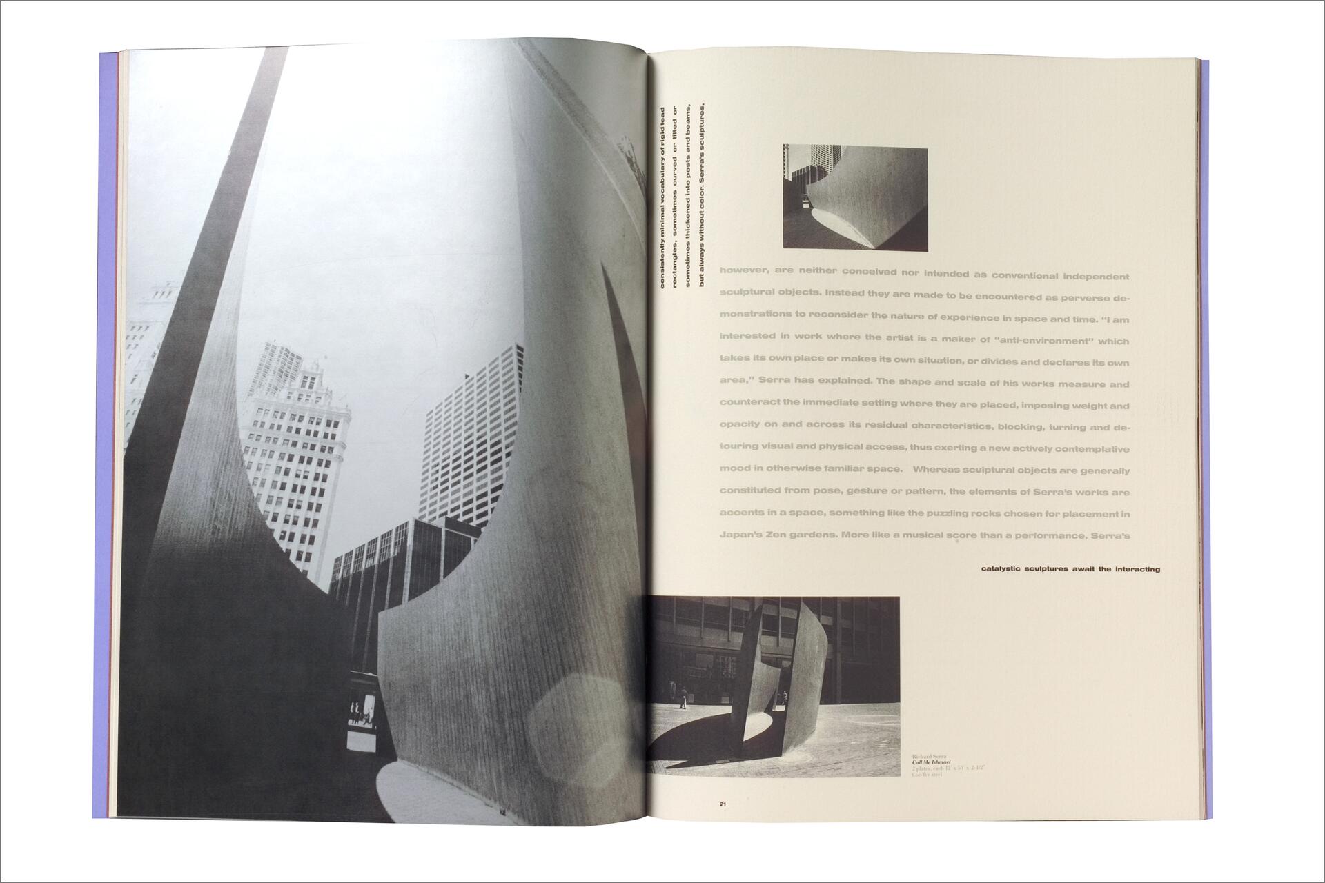 Open book showing a black and white photograph on the left page featuring curved architectural structures against a cityscape with tall buildings. The right page contains text and a smaller photo of a similar structure in a different setting.