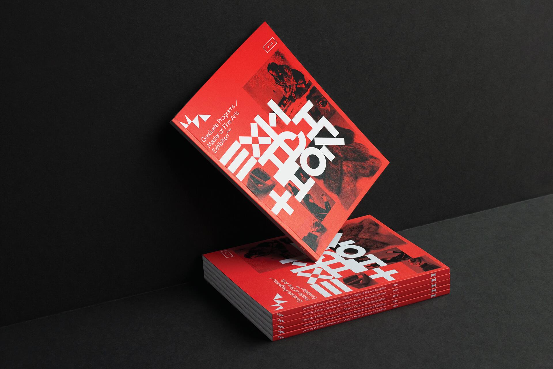 Stack of red brochures with bold, stylized text and abstract images on the cover, set against a dark background.