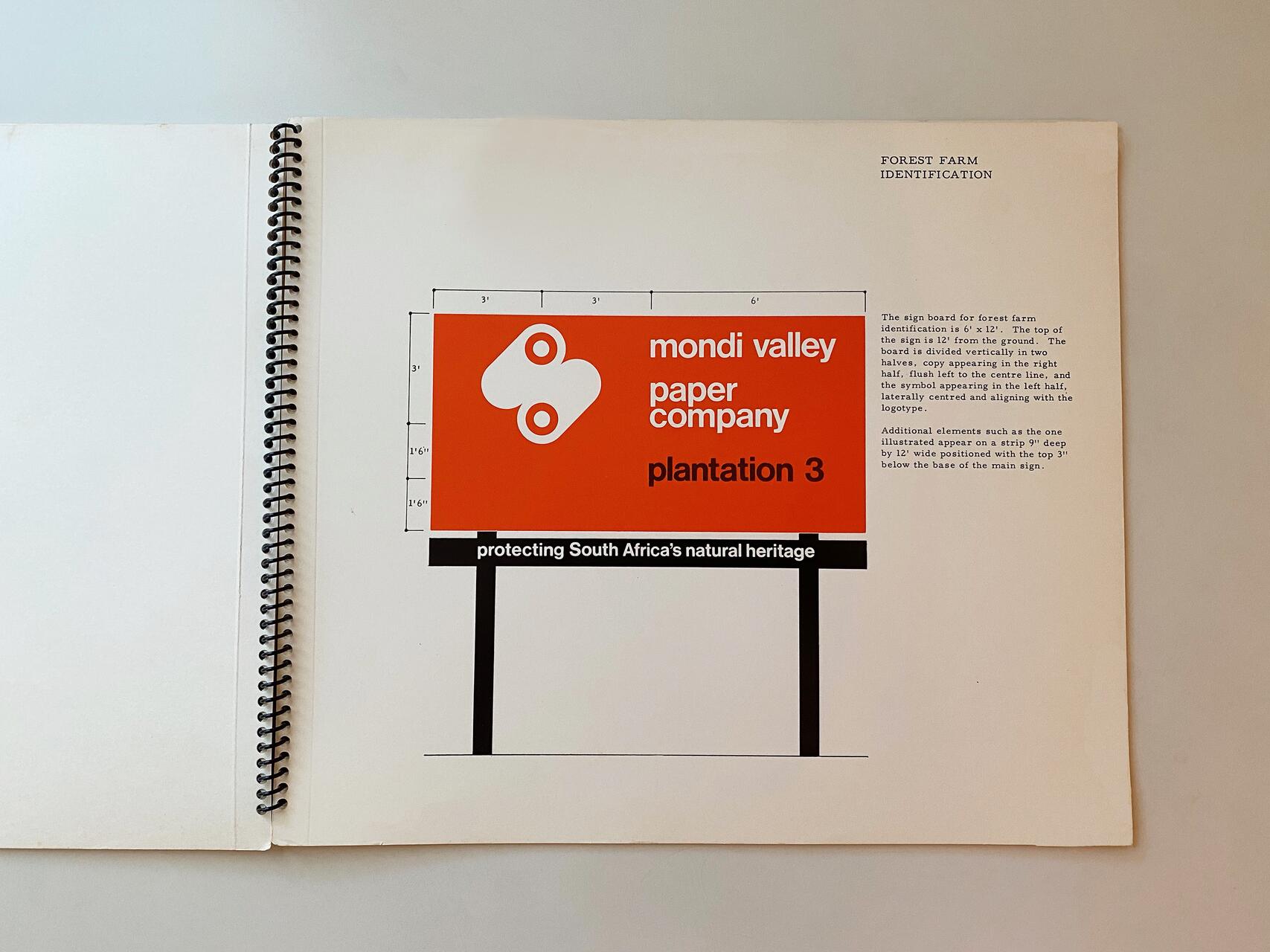 Spiral-bound booklet page with diagram of a billboard labeled "mondi valley paper company plantation 3" and the phrase "protecting South Africa's natural heritage." The page includes text about forest farm identification.