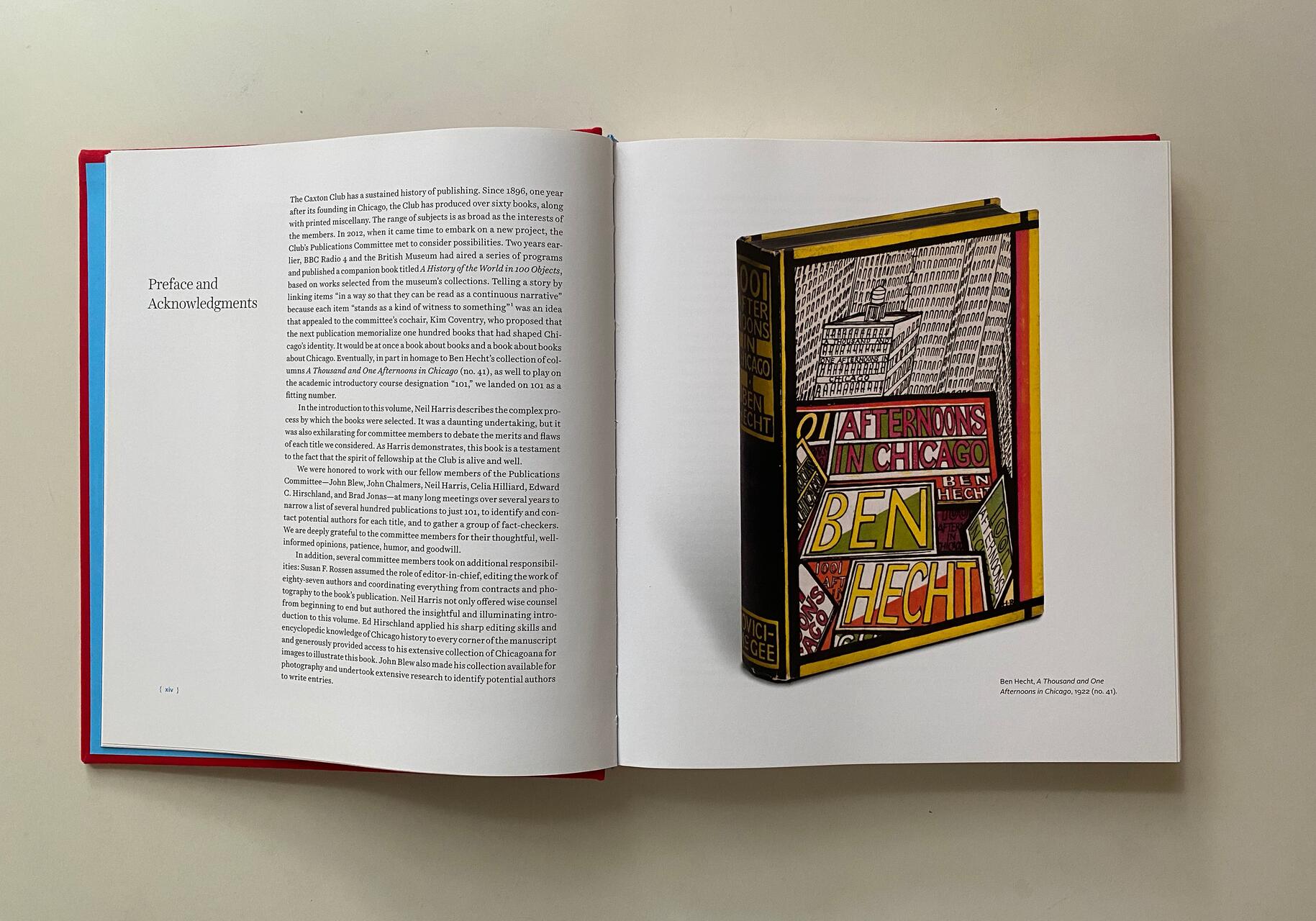 Open book displaying a page of text with the heading "Preface and Acknowledgments" on the left, and an illustration of a book cover titled "A Thousand and One Afternoons in Chicago" by Ben Hecht on the right, featuring colorful street signage and architectural drawings.