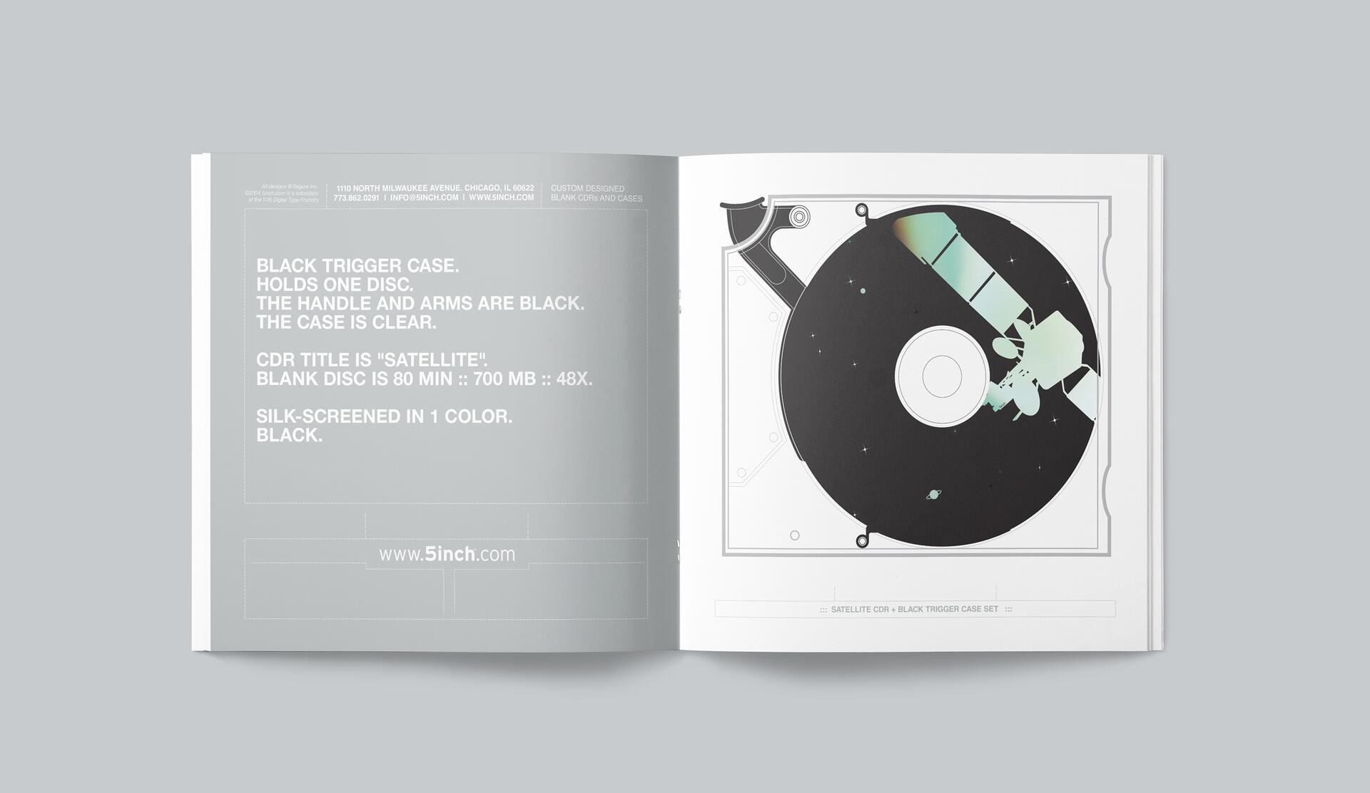 Open book showing a black circular graphic resembling a CD with a satellite design on one page, and text describing CD specifications on the opposite page. Gray background with minimalist design.