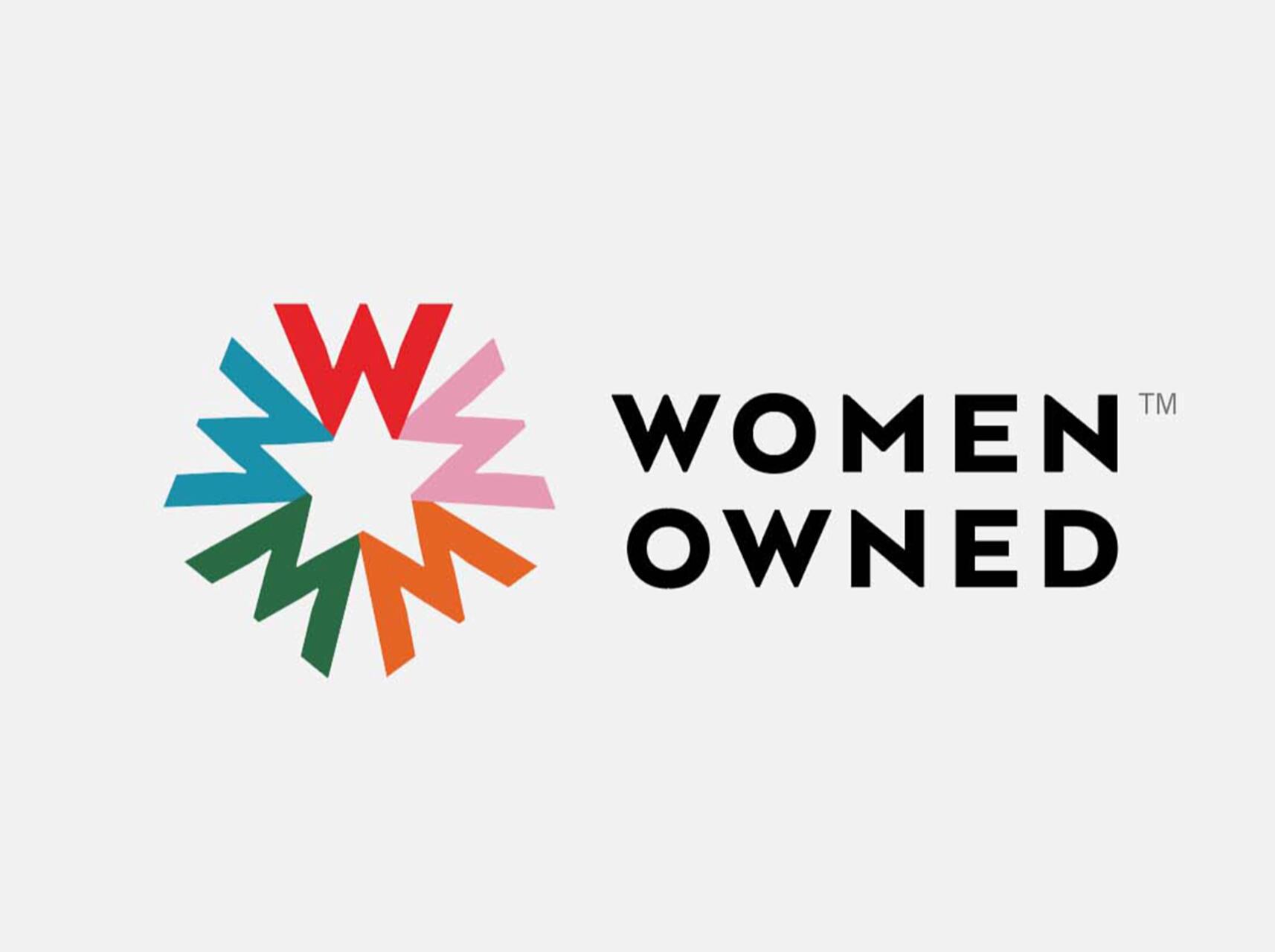Colorful logo with a geometric star made from interlocking "W" shapes in red, blue, pink, green, orange. Text on the right reads "Women Owned" in black.