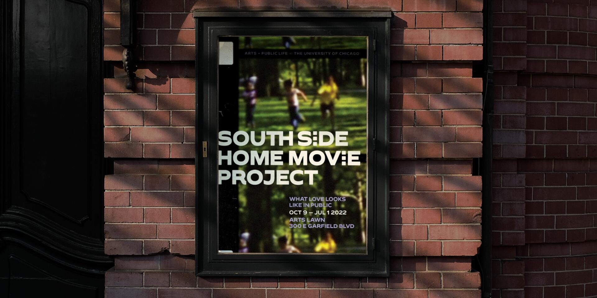 Poster on a brick wall for the South Side Home Movie Project, featuring blurred figures running on grass, with white and blue text detailing event information.