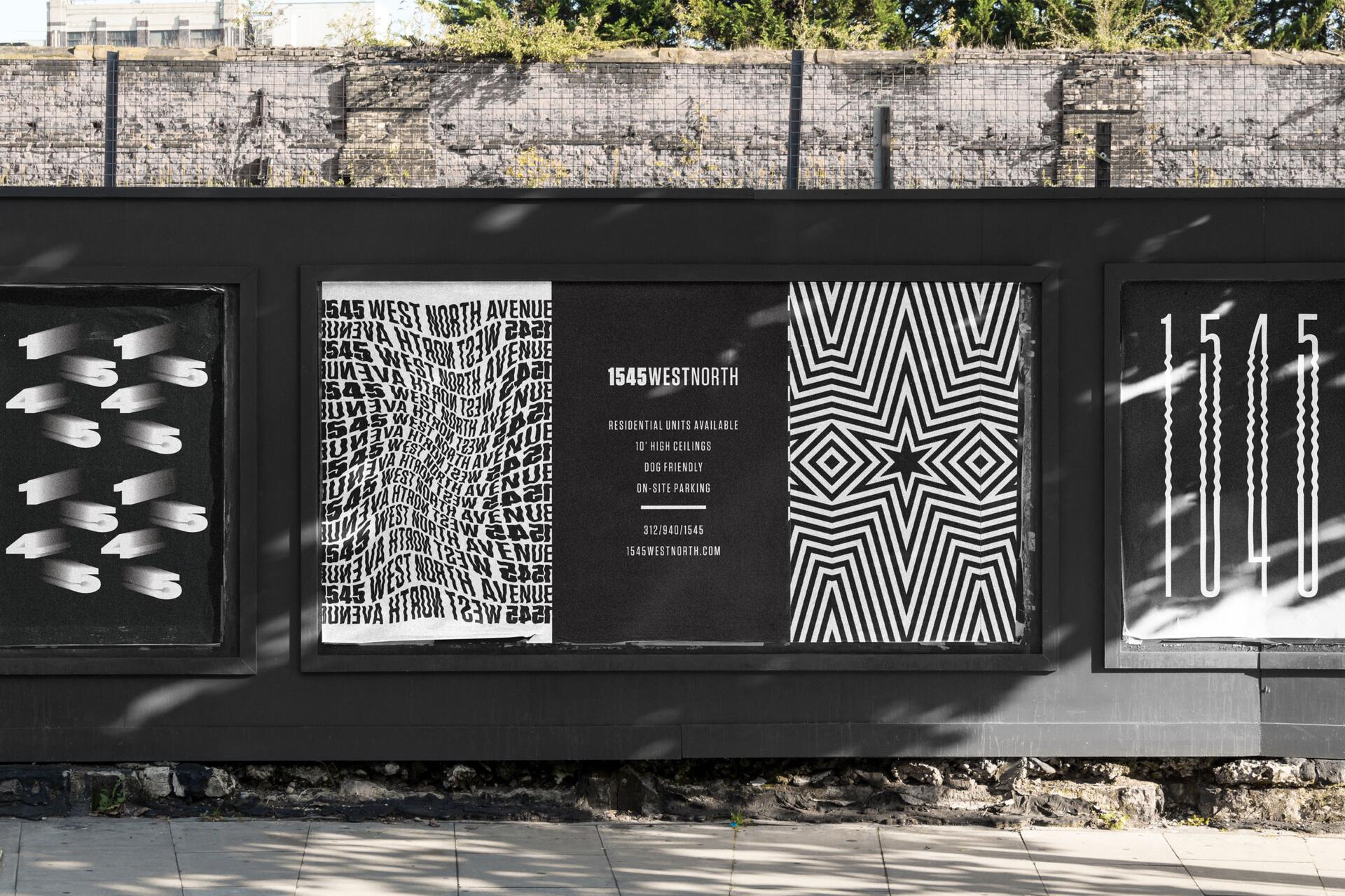 Graphic street art on a wall featuring various designs including distorted text, geometric patterns, and large numbers, under clear daylight with shadows cast on the pavement.