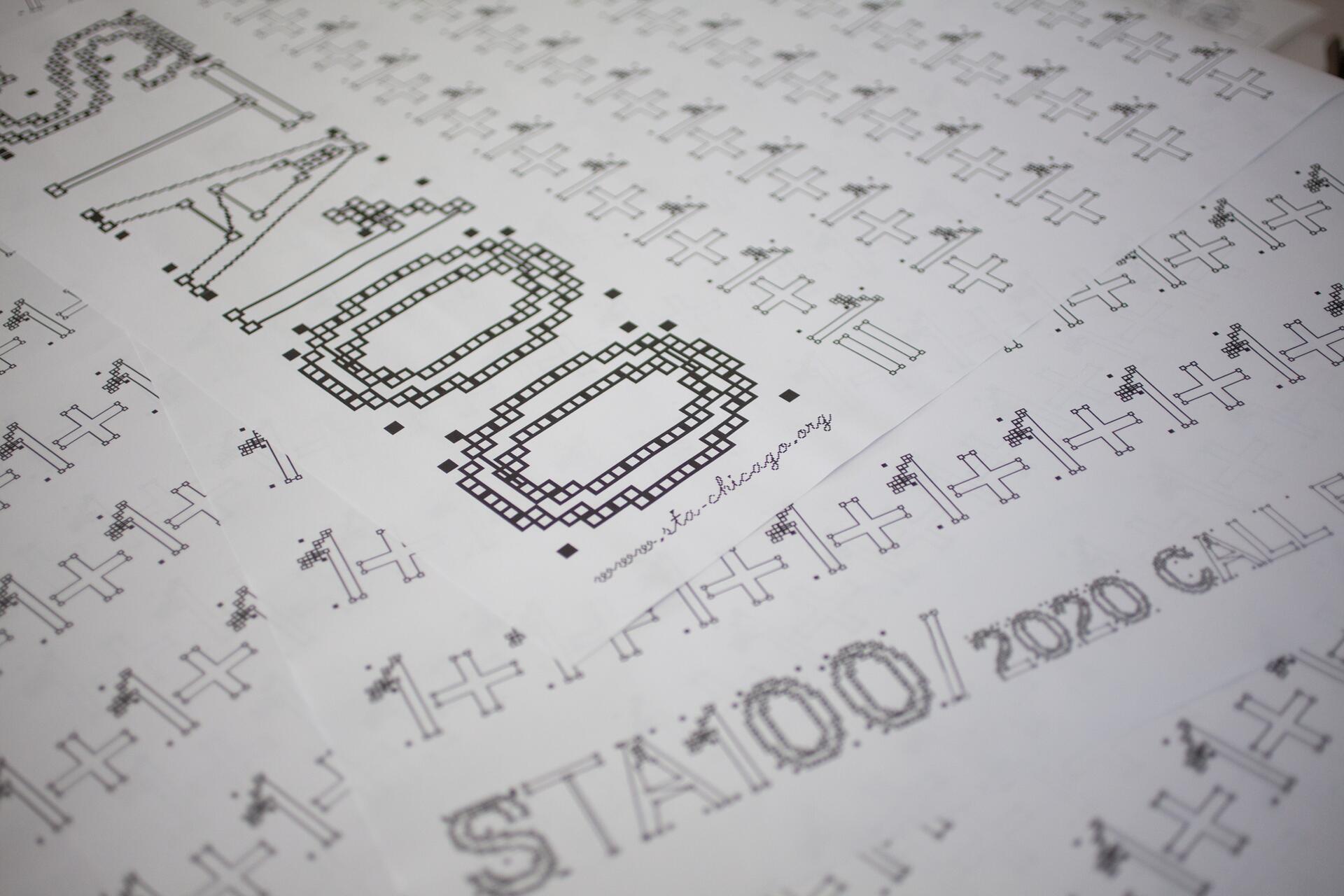 Abstract black and white geometric text design on paper, featuring "STA100" and repetitive "1+1" patterns.