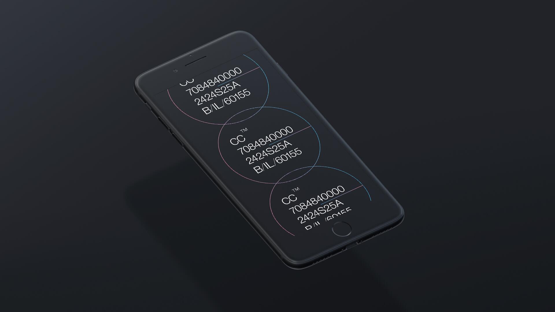 Smartphone displaying overlapping translucent circles with text and codes on a dark background.