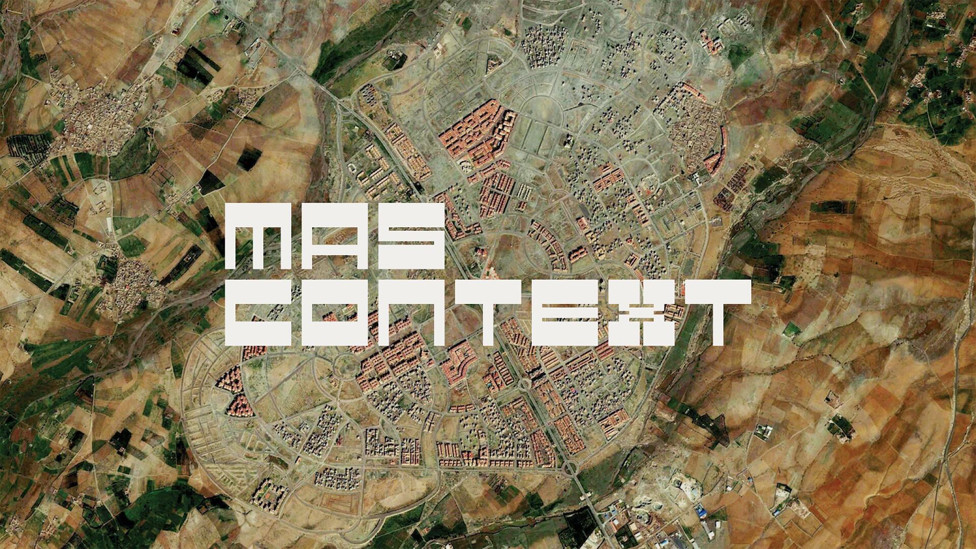 Aerial view of a city with grid-like street patterns and surrounding farmland. Large block text overlay spans the foreground.