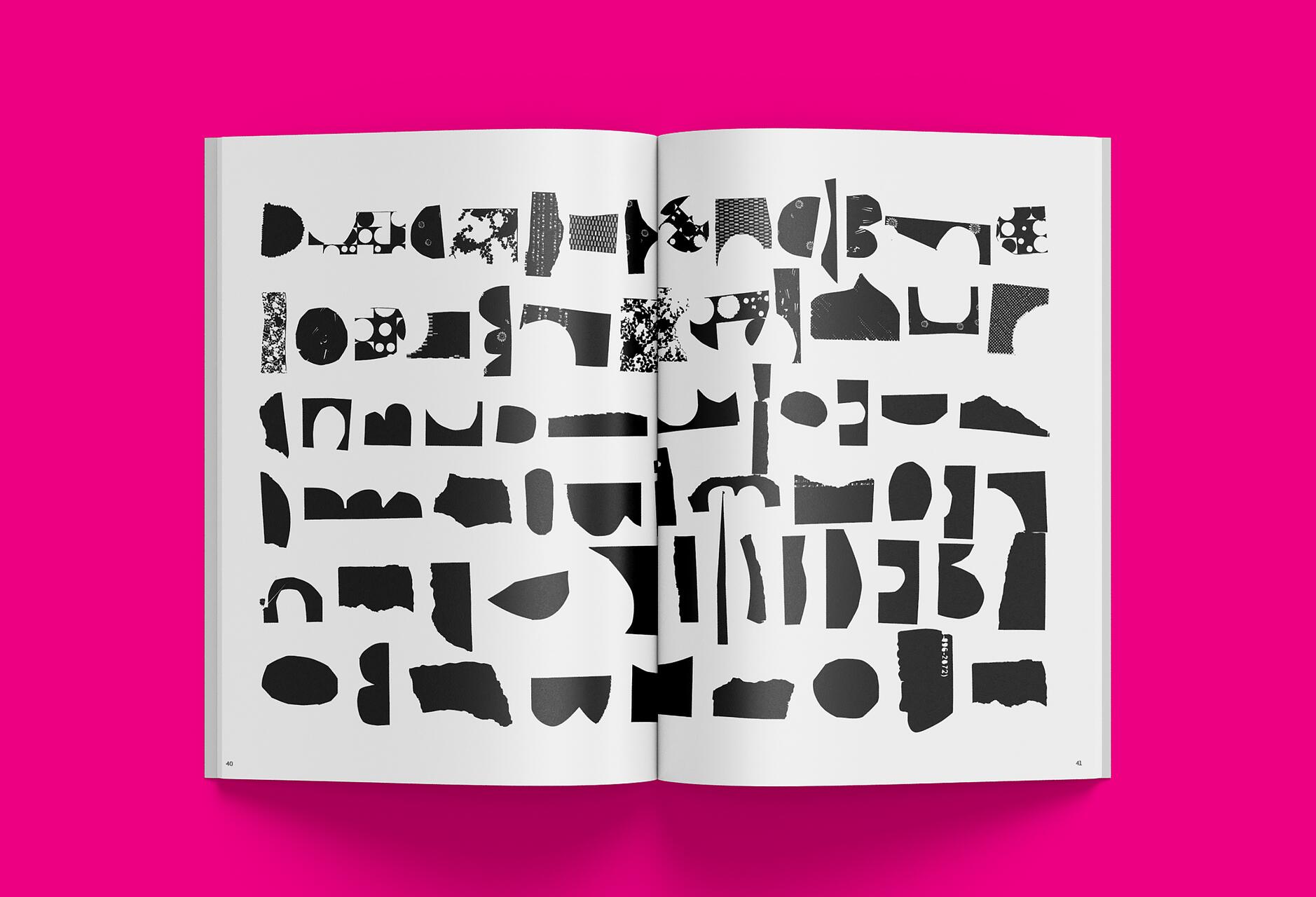 25B-11c_/v: Magazine — Issue 1 - Open magazine with abstract black shapes on a white page, set against a bright pink background_Sean Fermoyle