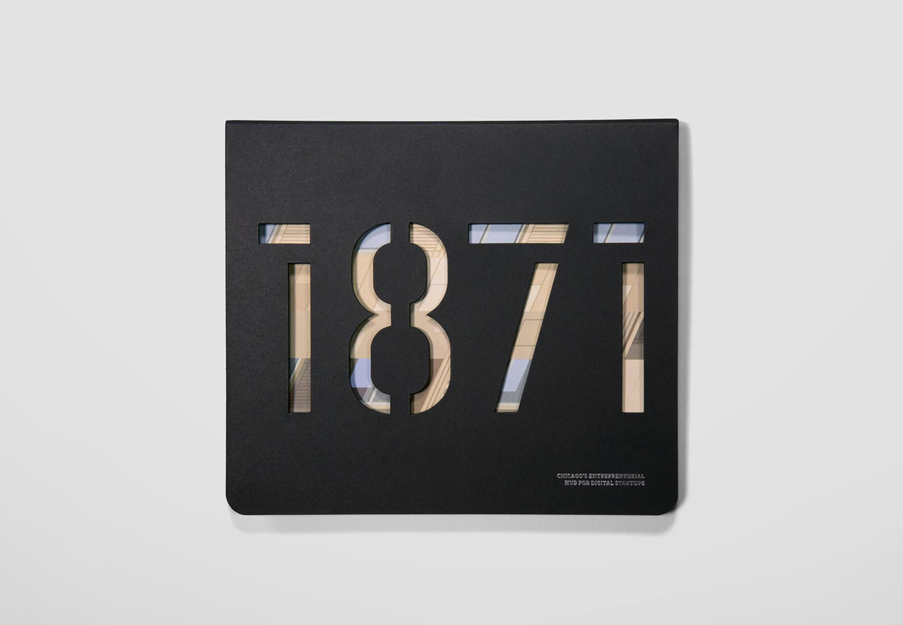 16A-41_1871 Annual Report: Black cover with die-cut numbers "1871" revealing abstract design beneath and title in lower right corner_Alisa Wolfson/Peter Ty