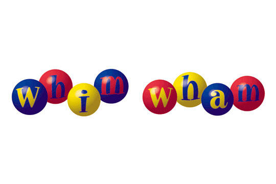 Colorful balls spell "whim wham," with letters in varying hues of blue, red, and yellow.