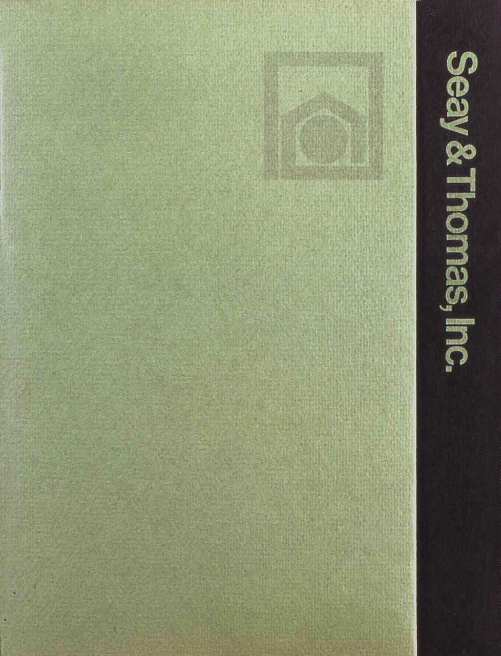 Green and black business card with a house logo and the text "Seay & Thomas, Inc." in white along the right side.