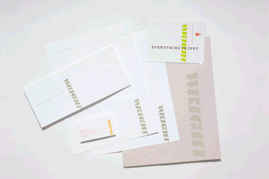 Stationery set with matching branding, including envelopes, letterheads, business cards, and a folder. Each item features the text "WRIGHT" in bold, with a minimalist design and a white and beige color scheme.