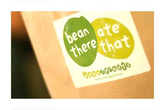 Logo with overlapping green and yellow beans shapes, reading "bean there ate that" above "beansprouts" and "healthy foods happy tummies."