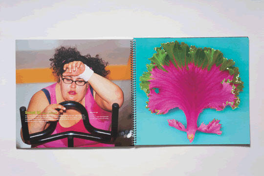 A woman in workout attire looks exhausted on an exercise bike, wiping her forehead. Beside, a vibrant pink and green leafy pattern on a blue background is displayed in an open book.