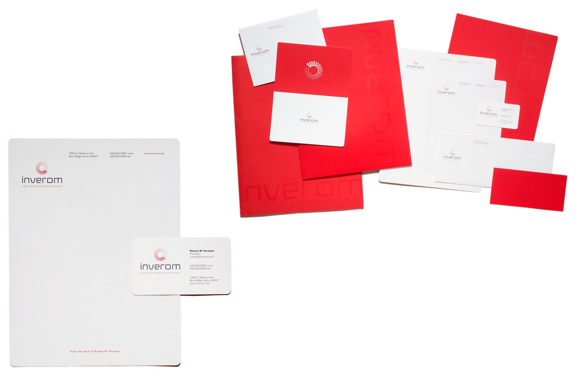 Business stationery set with red and white color scheme, including letterheads, business cards, envelopes, and folders featuring the "Inverom" logo.