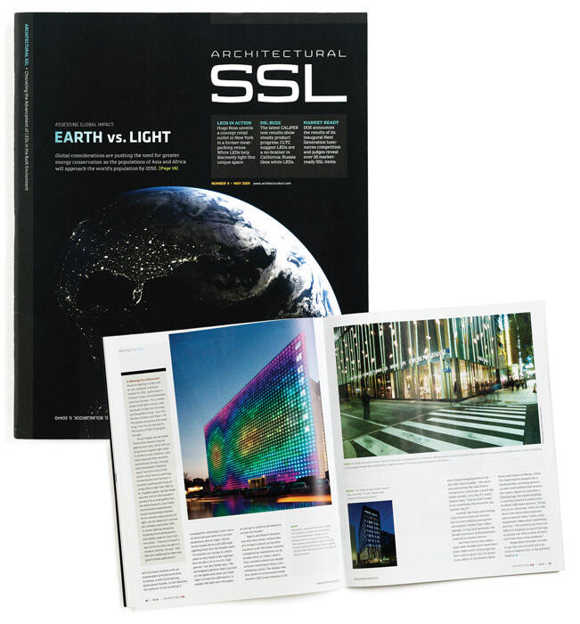 Architectural SSL magazine cover featuring Earth at night and two open pages inside showcasing brightly lit buildings and text.