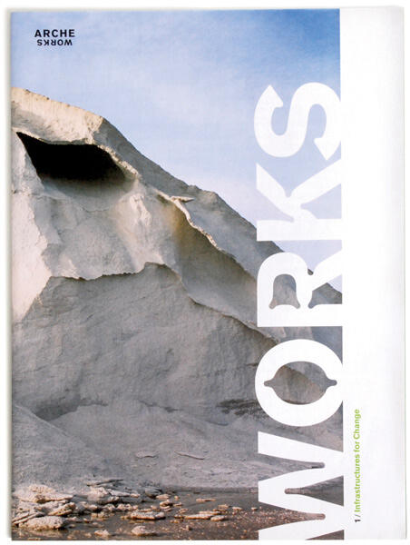 Rocky landscape with large, sandy-colored formations against a blue sky. White, bold text overlays one side, partially covering the rocks.