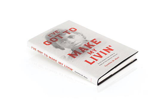 A book titled "I've Got to Make My Livin'" with a grayscale portrait of a woman on the cover and red text, photographed against a white background.