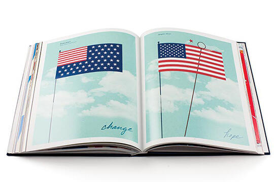 Open book displaying two stylized American flags against a blue sky with clouds. The left page shows a flag with evenly distributed stars and stripes labeled "change." The right page shows a flag with different proportions, labeled "hope."
