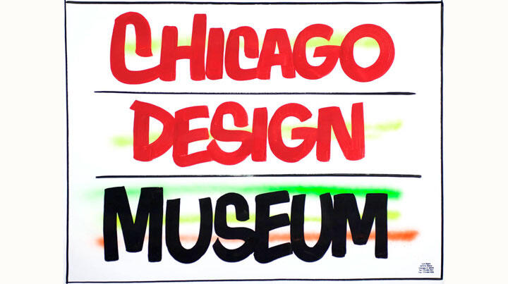 Chicago Design Museum sign with bold red and black lettering, accented by green and orange color strokes.