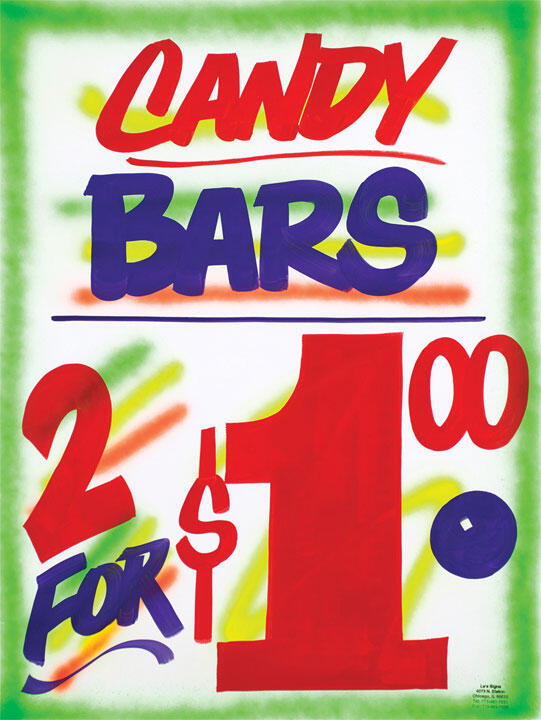 Candy bars sign in bold red and purple letters, offering 2 for $1. Bright green and yellow background accents.