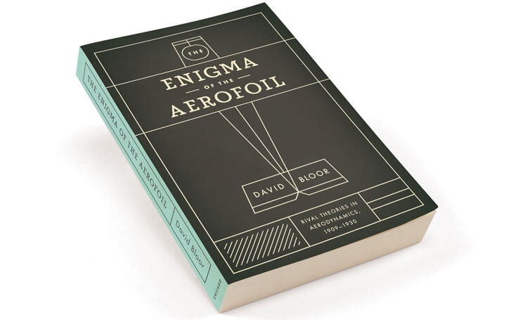 Book titled "The Enigma of the Aerofoil" by David Bloor, with a black and teal cover featuring geometric designs and lines, angled upward.