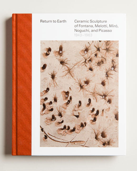 Cover of a book titled "Return to Earth." The design features abstract ceramic textures with a red spine on a white background.