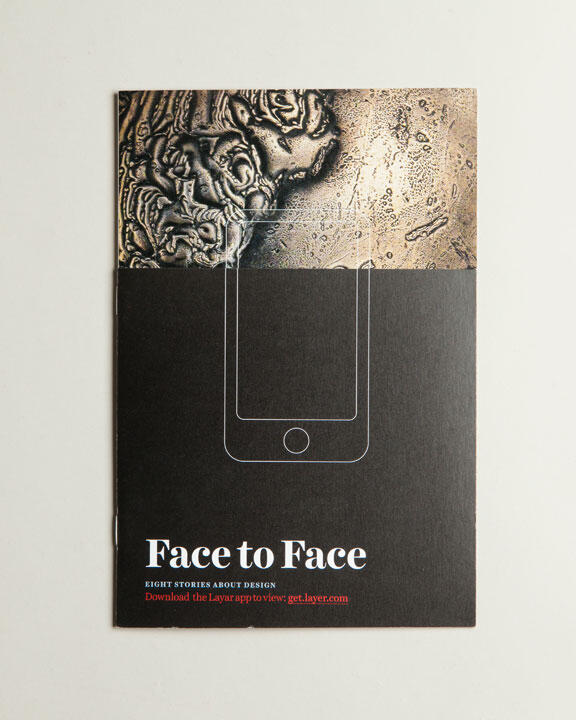 Brochure cover titled "Face to Face" featuring an embossed abstract face design at the top, overlaying a textured surface. The bottom half is black with a white outline of a smartphone.