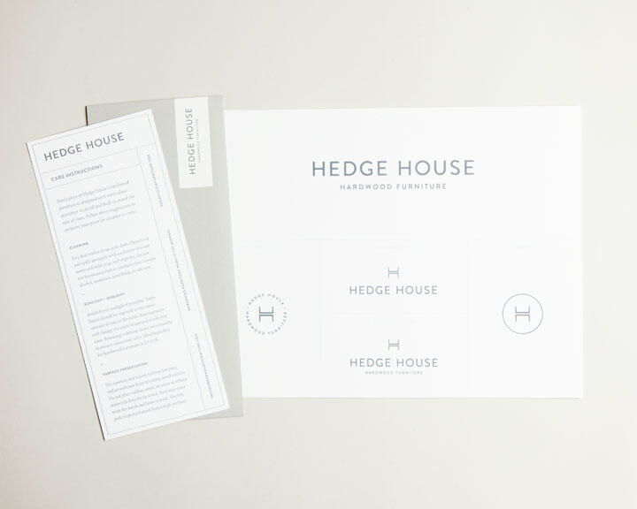 Brochure and leaflet for Hedge House Hardwood Furniture, featuring blue and grey text on a white background. The brochure includes care instructions, while the leaflet shows logo variations with an "H" inside a circle.