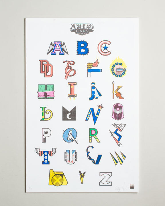 Alphabet poster featuring letters styled after superhero logos in various colors and designs.