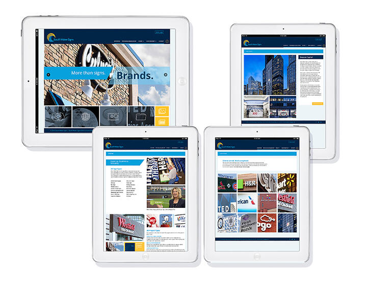 Four tablet screens displaying different sections of a website focused on signs and branding, showing various images and text. The screens are arranged in a collage against a white background, highlighting website design and navigation.