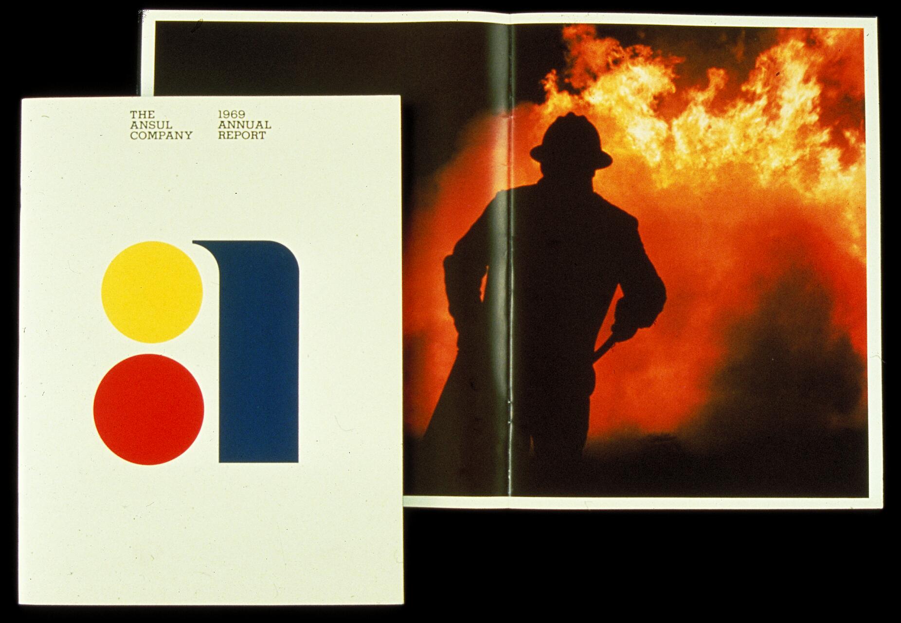 Annual report cover with a minimalist design featuring a yellow circle, red circle, and blue shape. Inside, a silhouette of a firefighter stands against a backdrop of intense flames.