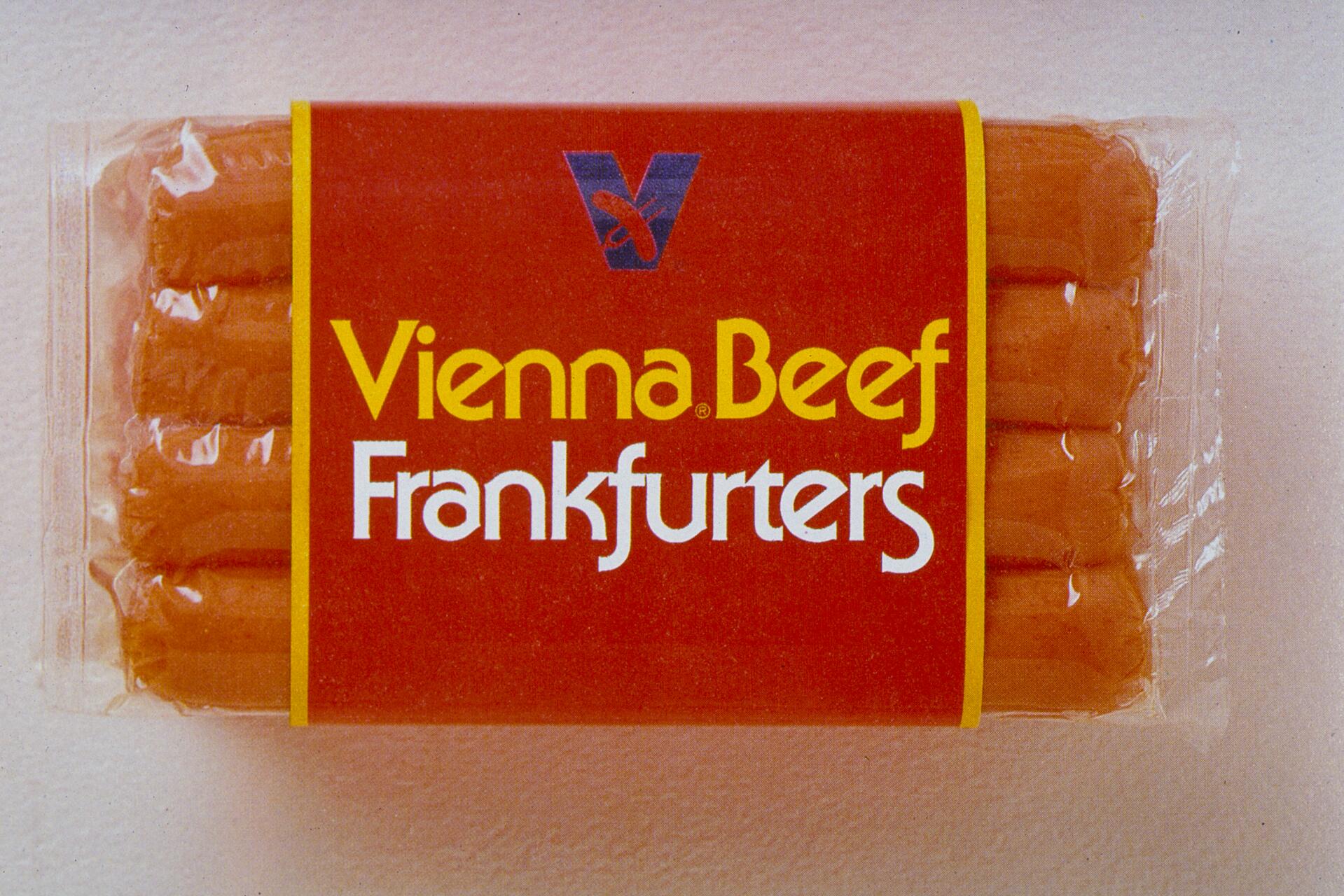 Pack of Vienna Beef Frankfurters in plastic wrap with a red label featuring yellow and white text.