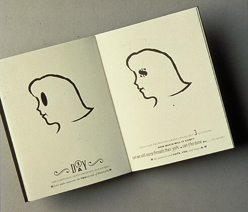 Open book with silhouettes of a woman's profile facing each other. The left page has a single silhouette, while the right page has a silhouette with text "SS" inside it. The pages have minimal text at the bottom.