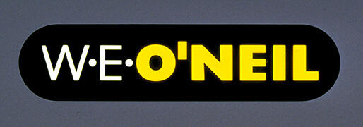 W.E. O'Neil logo with white and yellow text on a black oval background.