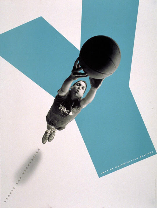 Basketball player in a YMCA shirt leaping to catch the ball against a white background with blue geometric shapes.